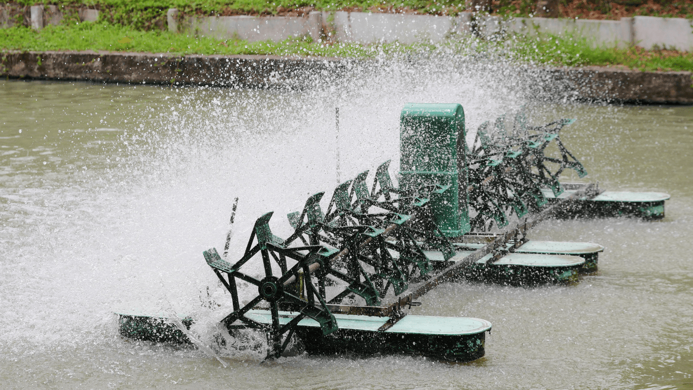 Aeration systems for industrial wastewater, showcasing industrial wastewater aeration systems in action. The image features a mechanical aerator with fine bubble diffusers and aeration blowers, supporting DO control for biological treatment aeration and efficient industrial water treatment