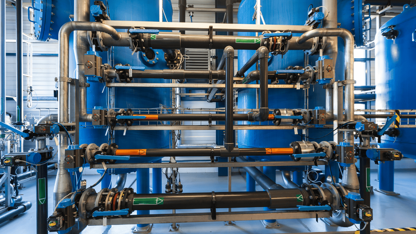 Industrial filtration systems used in industrial water treatment, showing large multimedia filter vessels, interconnected piping, cartridge and automatic filtration components for solids removal, turbidity control, and water reuse filtration, part of ProChem Water’s engineered industrial filtration solutions including activated carbon filters and oil removal filters.