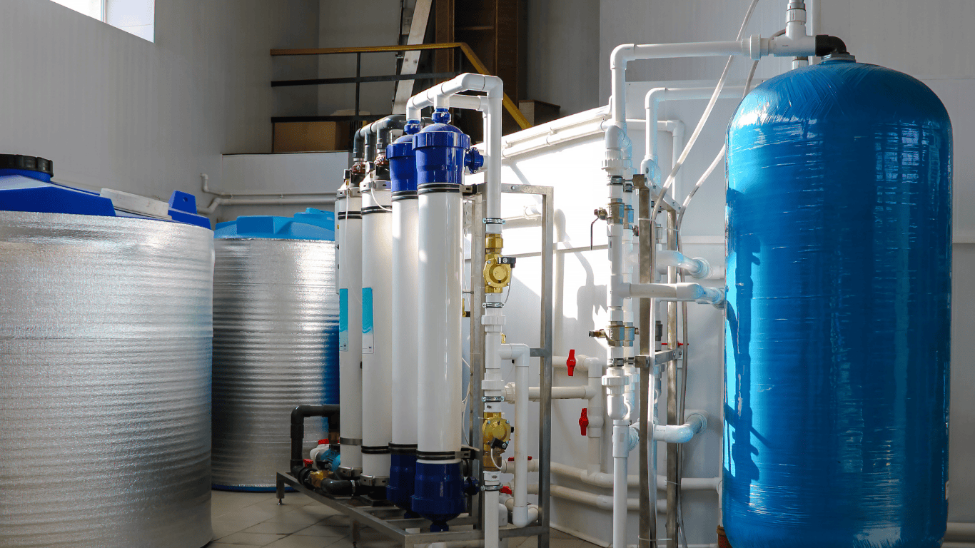 Industrial hazardous waste treatment systems inside a ProChem Water facility, featuring filtration tanks and piping used for hazardous waste services, industrial hazardous wastewater processing, RCRA wastewater treatment, toxic waste treatment, hazardous waste neutralization, advanced oxidation wastewater systems, heavy metals removal, and cyanide treatment systems for industrial wastewater compliance.