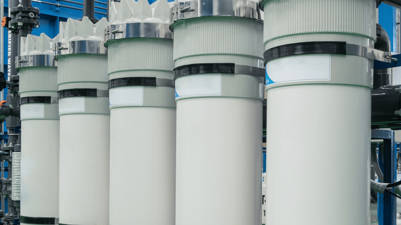 Industrial oil-water separator systems featuring large filtration units used for oil water separation, including coalescing separators and API separators, as part of oily wastewater treatment and industrial wastewater solutions by ProChem Water.