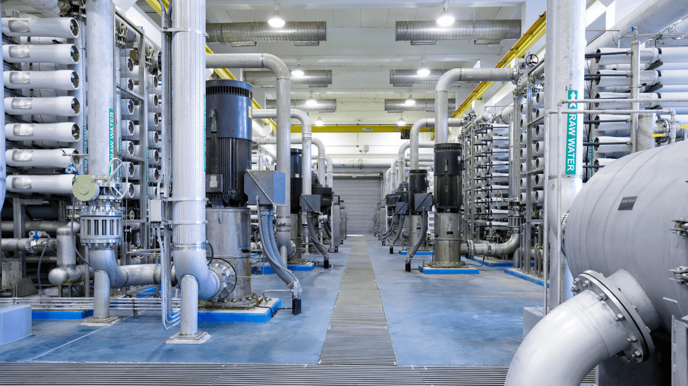 Industrial reverse osmosis systems inside a water treatment facility, featuring high-pressure pumps, membrane systems, and advanced RO equipment used for high-recovery RO, brackish water RO, and seawater RO applications. This setup represents a leading RO equipment manufacturer specializing in industrial RO systems, desalination systems, process water treatment, water reuse, and ZLD/MLD RO technologies, including energy-recovery RO solutions provided by ProChem Water